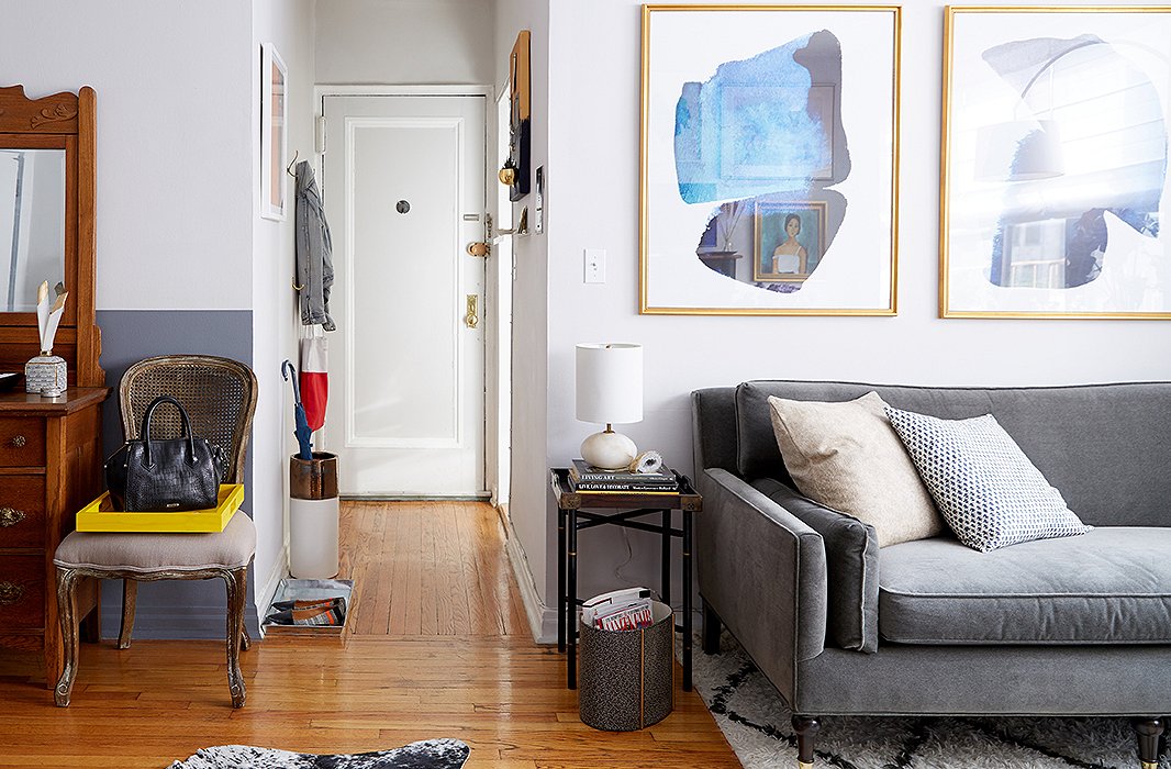 The narrow entry hall meant that organization and storage were key to keeping clutter from spreading into the other areas of the home. The hooks and catchalls make perfect checkpoints for when Ari leaves and comes home.
