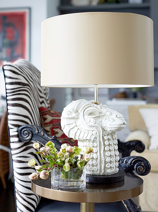 “This is my little ethnic moment,” Barbara says of the pairing of an African chair and her own artful Mythic Llama lamp. She bought the chair from a vendor who was exhibiting across the aisle from her at one of the many trade shows she’s participated in since founding her business in 1997.
