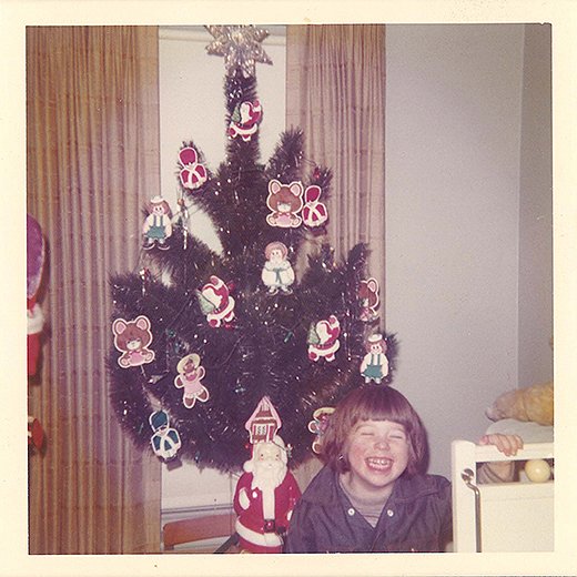 Bob at age four with a Christmas tree decorated by his brother as a surprise. “I have such a powerfully happy memory of coming home and finding that tree, and that same feeling of wonder still comes over me each year at the holidays,” Bob writes.
