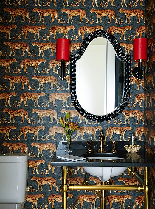 The powder room pops with yet another example of a timeless animal-inspired motif.
