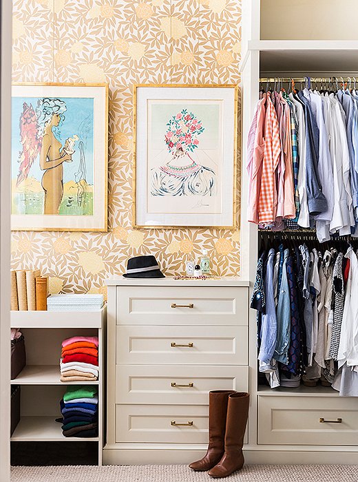 Nina outfitted the master bedroom closet with an Osborne & Little wallpaper and Dalí prints for a whimsical note. “It’s fairly large for a city closet, but I love that it’s so open,” says Nina of the tailored space she shares with her husband.
