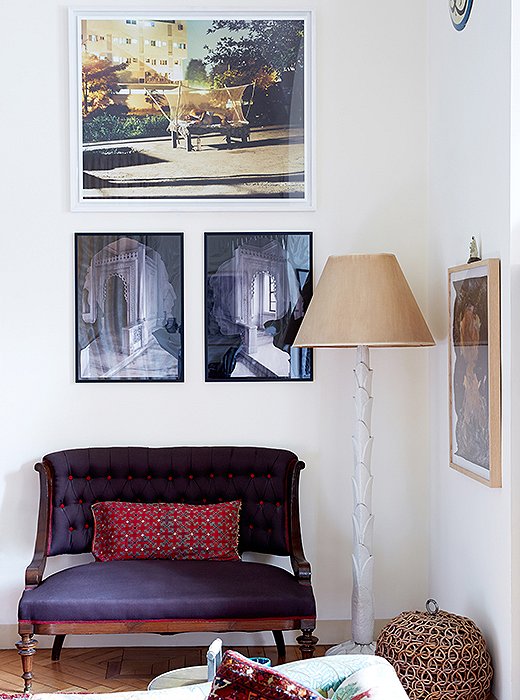 Above a settee hang a split-in-two image by Italian artist Gianluca Malgeri and an image by Indian photographer Dhruv Malhotra, who wanders the New Delhi streets at night photographing people sleeping.
