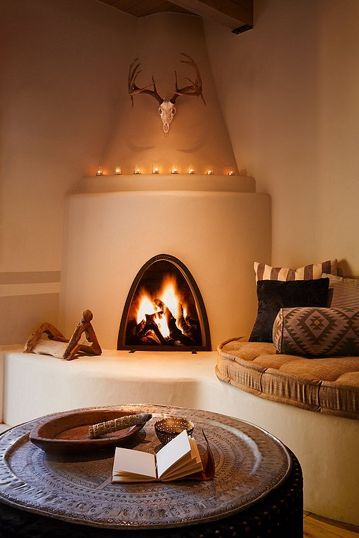 Each of the hotel’s 83 guest rooms has its own kiva fireplace, as do the freestanding suites. 
