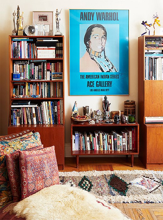 A poster depicting Russell Means keeps watch over the living room. Shelves are packed with many books she admits to never reading, but Some of Me, written by close friend Isabella Rossellini, is a continual source of inspiration. “You read it and you feel like you’re talking with a friend,” Hardison says. 
