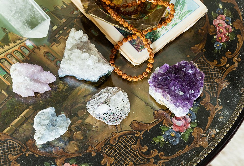 An antique side table in Shiva’s living room is topped with a few of her crystals: amethyst (“for spiritual growth and healing”), smoky quartz (“for grounding and anchoring you to Mother Earth”), and a heart-shape quartz (“for personal growth”).
