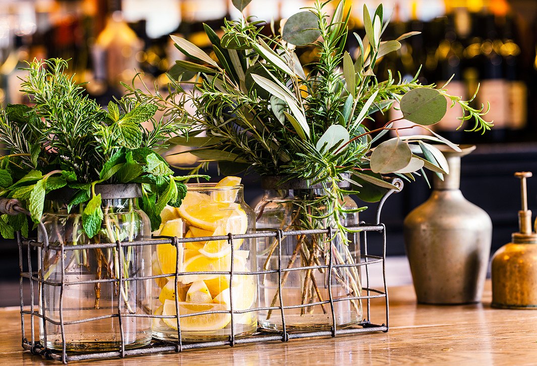 A bright display of herbs and lemons on the A.O.C. bar.
