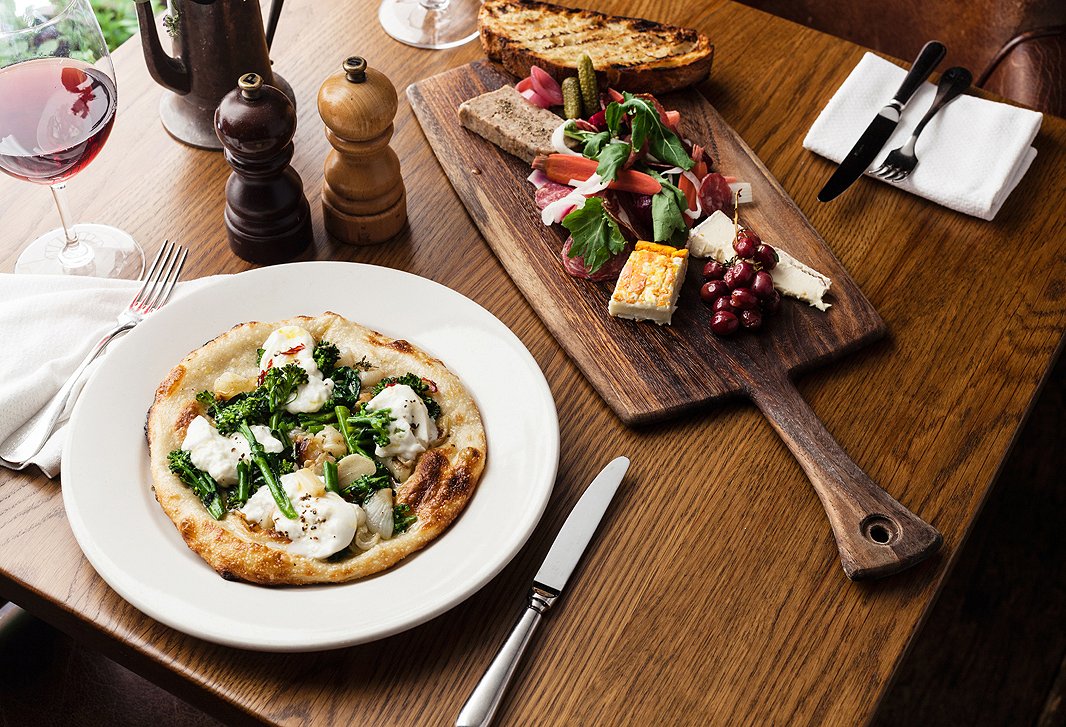A.O.C.’s mouthwatering focaccia and vintner’s plate.
