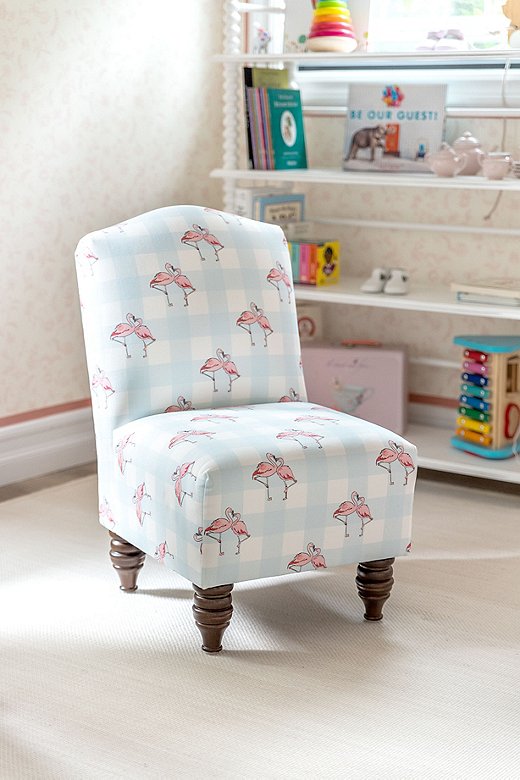 With its pastel check pattern, the Flamingo Gingham Kid’s Chair, which Gray used in his twins’ playroom, is the ultimate in preppy chic. 
