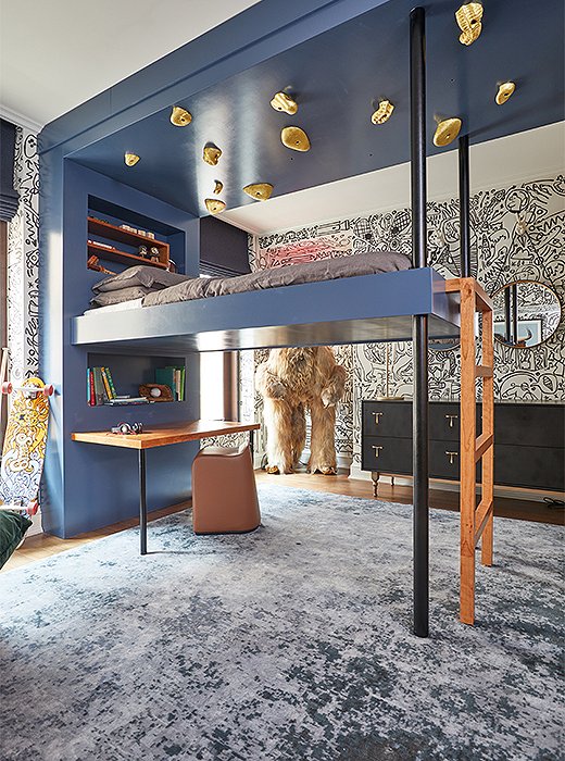 Gabriel and Brooke Anderson of Dean & Dahl dreamt up a kids’ bedroom primed for fun. Imaginative touches such as a loft bed encased by a climbing wall, a shaggy figure resembling Bigfoot, and a graffiti-style mural by Utah-based artist Carrie Ellen come together to create a space that lifts the spirits of both young and old.
