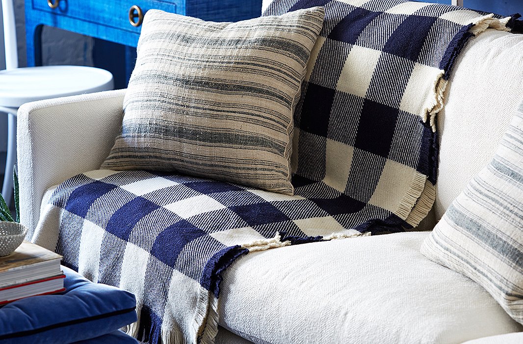 The navy gingham blanket was the launching point for Ben’s design. “It’s a favorite pattern of mine, and the large scale of the print makes it a little more modern.”
