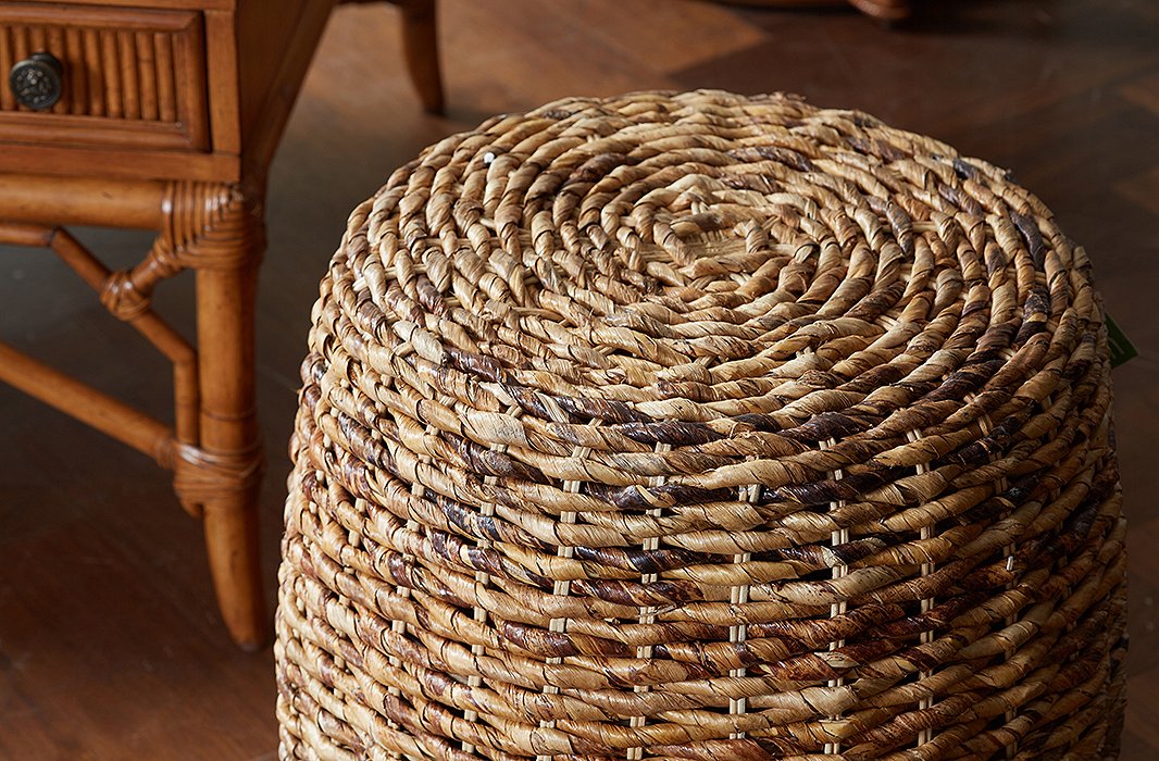 This petite wicker side table is made of abaca, a natural fiber so strong it has traditionally been used in rope making.
