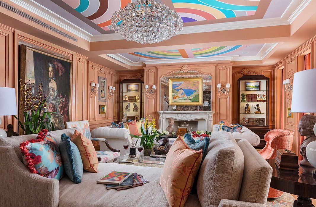 “Art and à la carte,” says Barbara Ostrom when asked about her salon-style space. Envisioning it as a place of refuge for a pair of avid art collectors, she included works by John Mellencamp alongside cases filled with first-edition tomes and a Han Dynasty horse. Oh, and the ceiling? Frank Stella prints refashioned as wallpaper. Peachy walls glossed to perfection yield divine complexions for all who enter. 
