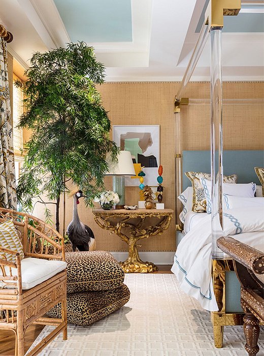 Rome-born designer Alessandra Branca has long created spaces that combine classic beauty with everyday comfort, and her Kips Bay bedroom is no exception. The sunshine-infused palette of yellow, gold, and blue fashions a serene atmosphere. Old World touches such as a sculptural gold console were paired with such contemporary anchors as an acrylic-and-brass four-poster bed.

