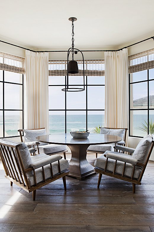 The breakfast room is Chris’s favorite. “When you have that view, it’s hard not to love the room. You sit there, you’re comfortable, the ocean’s right there…” The well-cushioned, comfortably pitched chairs, as much as the view, encourage lingering.

 

