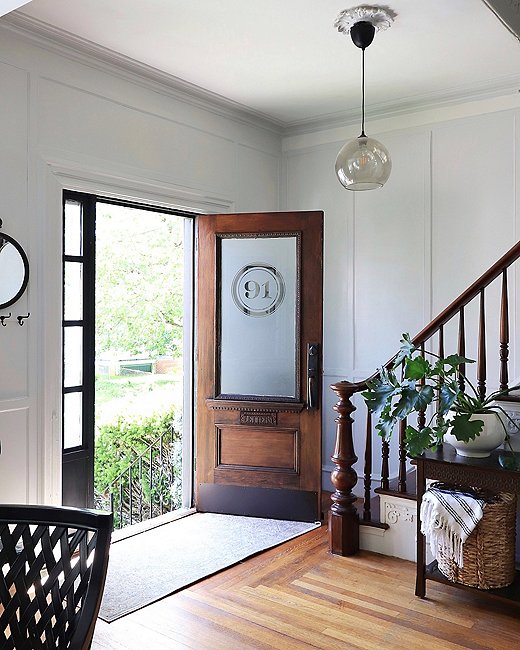 This charming front door matches the Victorian exterior of Carli’s house and helps set the tone of Carli’s traditional-meets-modern style.
