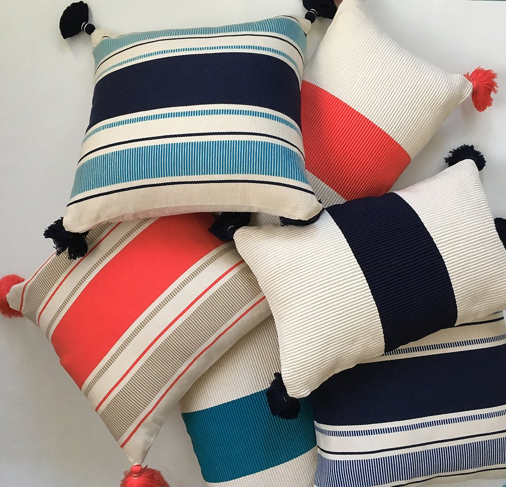 The Cabana Stripe and Laguna Stripe pillows are handwoven by Peruvian artisans on Incan backstrap looms.
