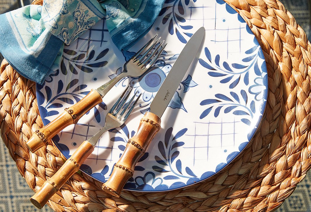 Play up the textures and hues of the season with colorful shatter-proof melamine tableware and accents in natural materials. Find the flatware here and
