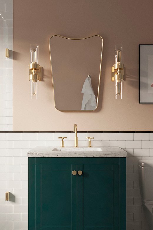 “We’re seeing quite a lot of homeowners adding color to their kitchens and bathrooms with painted cabinetry right now,” says Becca. Green is a soothing color for the bathroom, and it’s trending right now.
