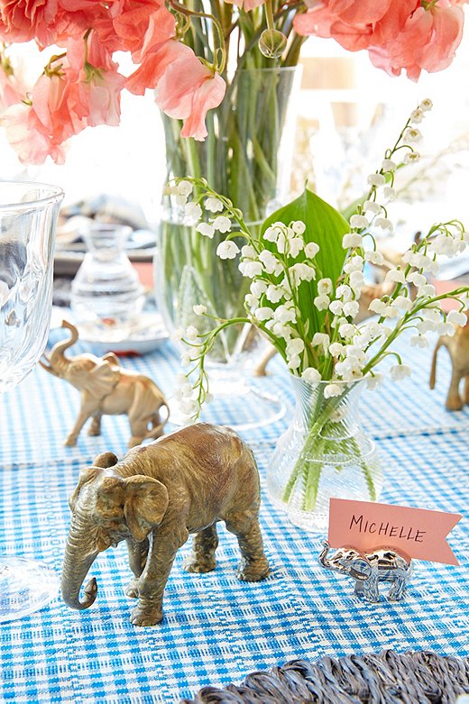 Susan has been collecting elephant figurines for years and pulls them from around her house to add to her table when she entertains. Juliska’s mini vases and Acanthus vase make up the rest of the centerpiece. 
