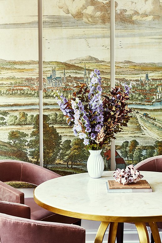 Oversize artwork anchors the open floor plan living area of this New York apartment. Room by One Kings Lane Interior Design; photo by Frank Tribble. 
