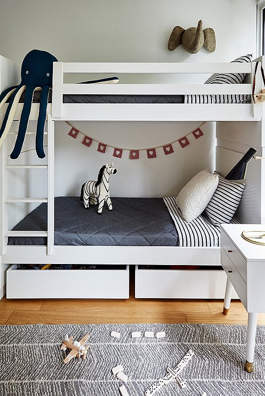 “The kids are obsessed with the elephant,” Michael says of the plush animal hanging above the bunk bed. “I was telling them Elsie is the name of the One Kings Lane elephant mascot, so they decided its name should be Elsie Junior.”
