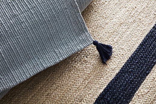 Many of the Open House rugs sport tassels on their corners. All are woven of either jute or jute and cotton, jute being the softest of the natural fibers used for floor coverings.
 
