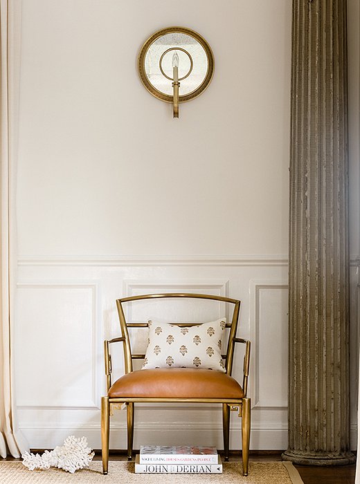 A stone pillar complements the home’s classic architecture.
