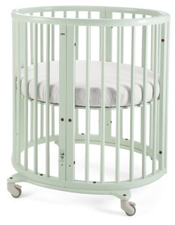 green mini crib