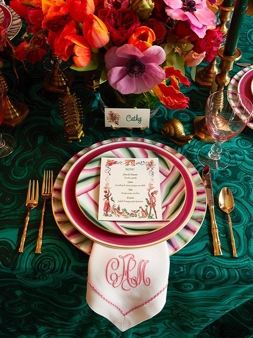 A wild mix of flowers and patterns makes this Eclectic table come alive. Photo courtesy of Catherine Austin.
