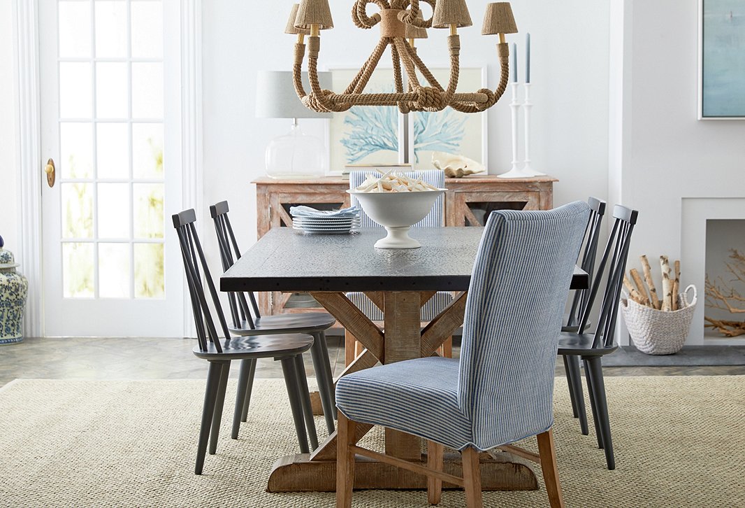 Thin blue ticking stripes are the perfect partner for coastal-inspired accents. Photo by Tony Vu.
