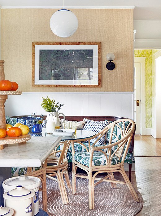 Virginia is not afraid of pattern. The paisley fabric in the breakfast nook echoes the wall covering in the entryway.
