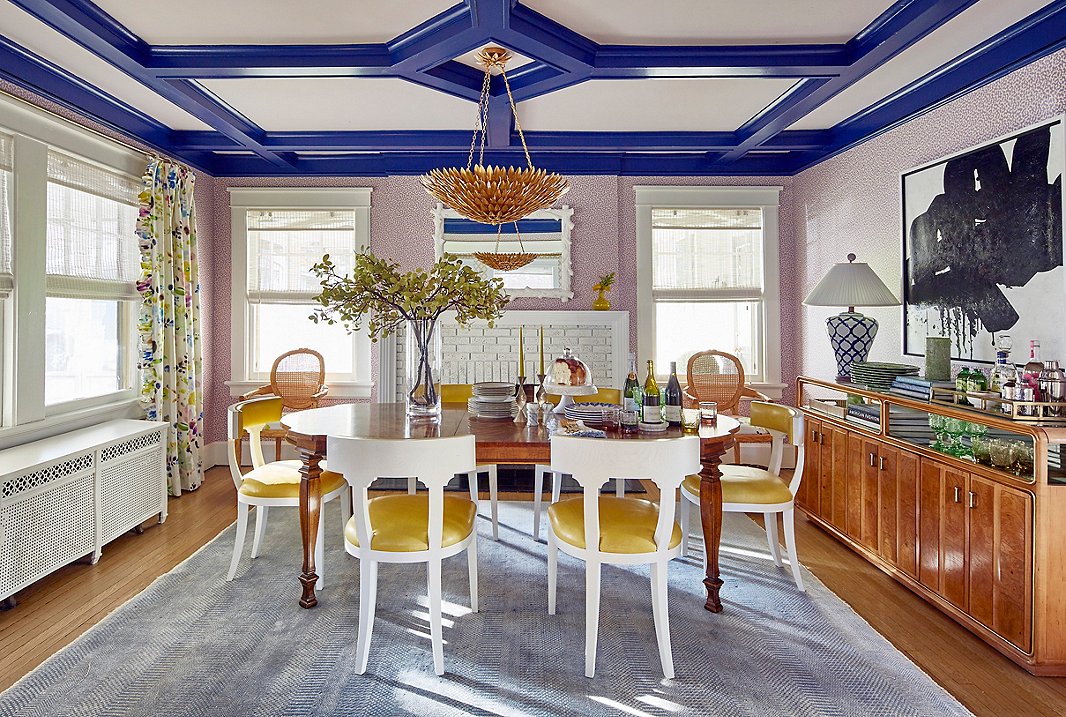 Coffered ceilings like the one in designer Virginia Toledo‘s dining room can make a space feel airier. Painting the trim blue adds cheer and panache. Find the light fixture (also available as a flush mount and a semiflush) here. Design by Toledo Geller. Photo by Jacob Snavely. 
