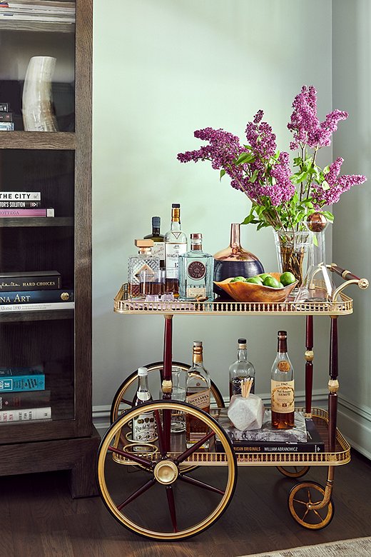 Because the couple loves entertaining, a well-stocked bar cart was a must.
