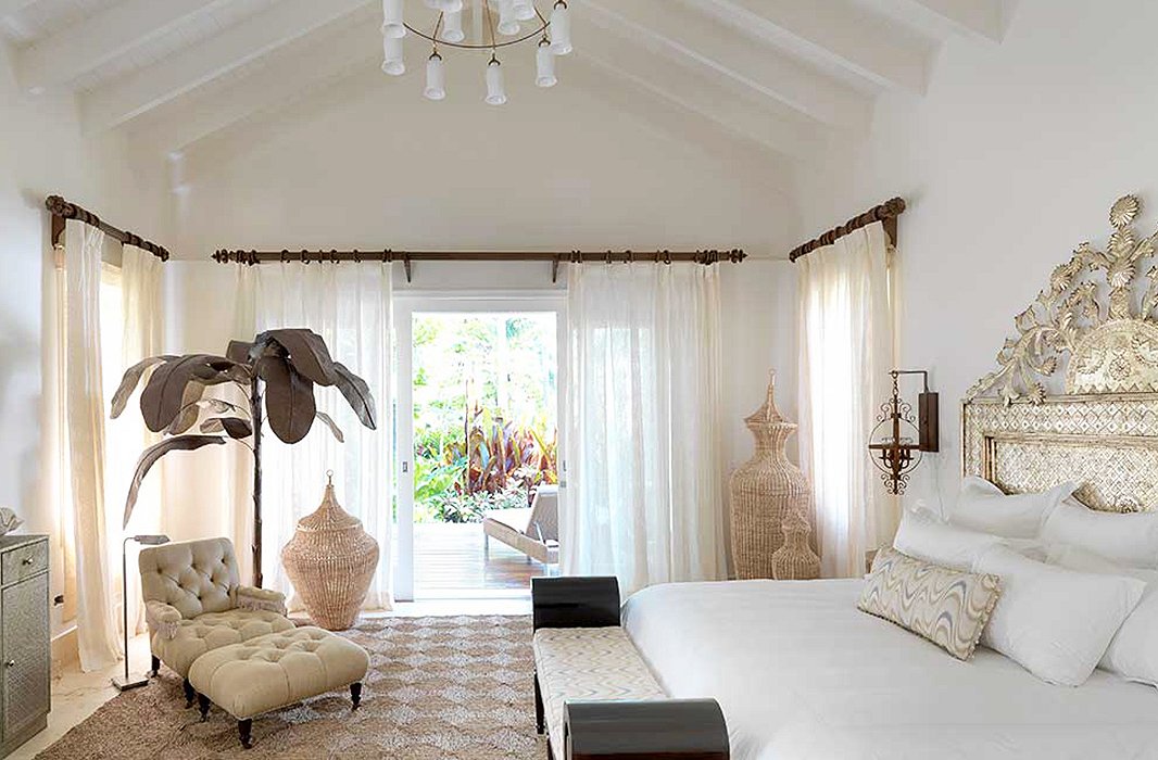 Natural textures and chic finishing touches in an airy bedroom by Celerie epitomize her relaxed, glamorous style.
