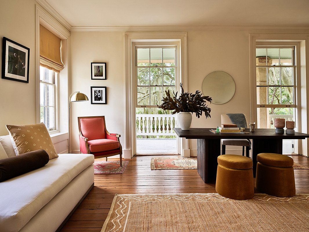 The James Accent Chair is classic in design, but the coppery upholstery is straight out of the Southwestern palette. Ditto the ocher hue of the streamlined velvet Shiloh Swivel Stools. As a result, they elevate the earthier elements of the space—the wool-and-jute Orchard Ripple Rug, the reclaimed-wood Raquel Dining Table used here as a desk—while maintaining the overall relaxed, organic vibe.
