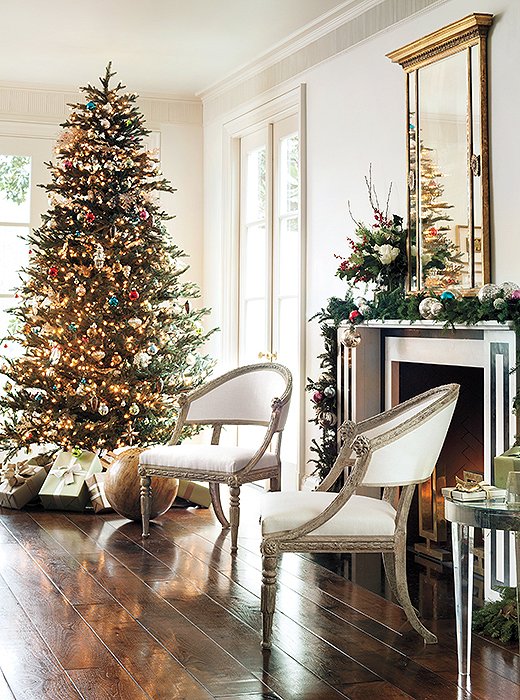 The organized chaos of a tree is the perfect combination of personal and public. Try a mix of ornaments to accentuate the look.
