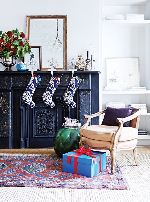 Small touches can go a long way to making your space feel festive. Stockings and holders added to your mantel embrace the season with style.
