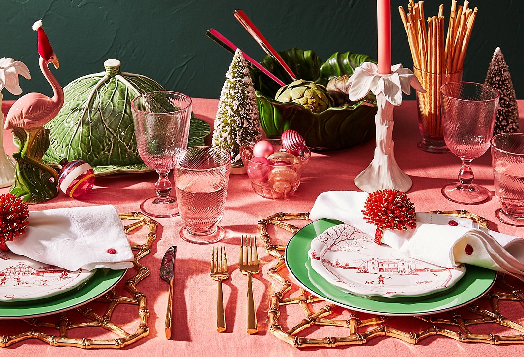 Give your table a preppy, poppy twist with a mix of green, pink, and red. Lettuceware, bottle-brush trees, and plates from Juliskaâs Country Estate holiday collection create a fabulously unexpected look. 