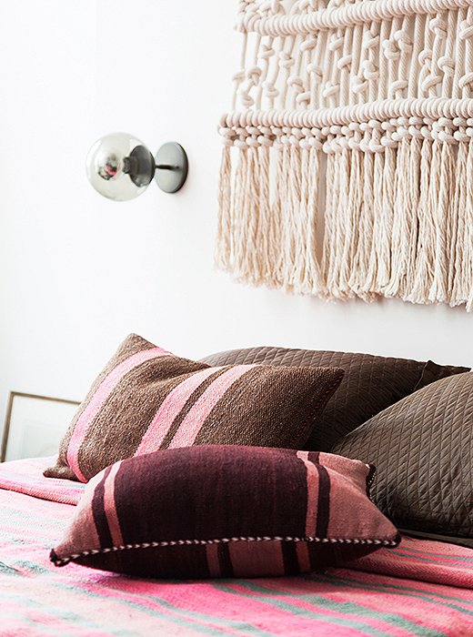 These pillows have made their way into nearly every room. Made of Berber rugs, they are great of example of how to reimagine vintage textiles purchased abroad.
