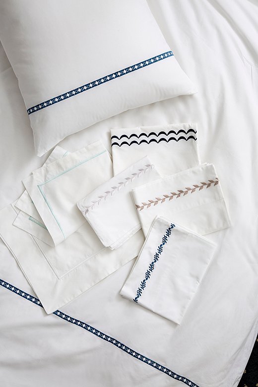 Our exclusive embroidered bedding collection is made in the USA of crisp cotton from Portugal, long known for its luxurious textiles.
