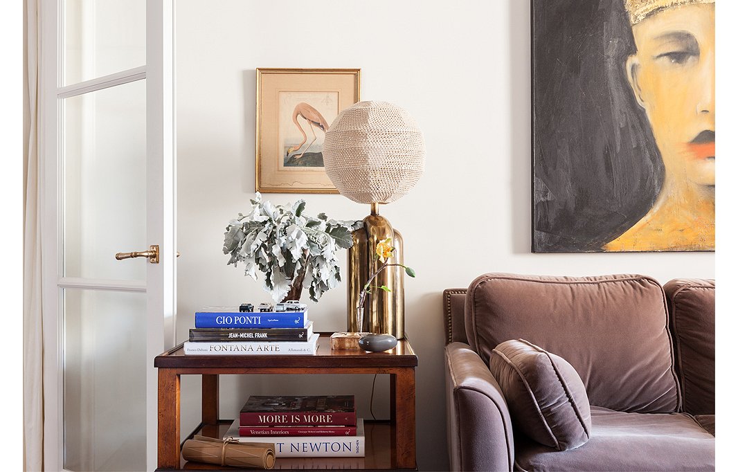 Smith, an admitted design-book addict, only keeps out titles she references regularly for inspiration. A crocheted lampshade, recently scored at a flea market in Florence, makes the perfect topper for a vintage lamp.
