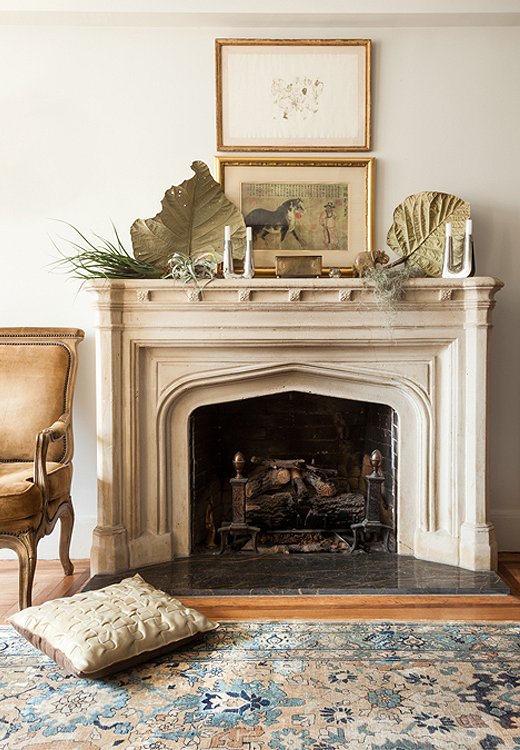 A layered composition gives the mantel an artful elegance.
