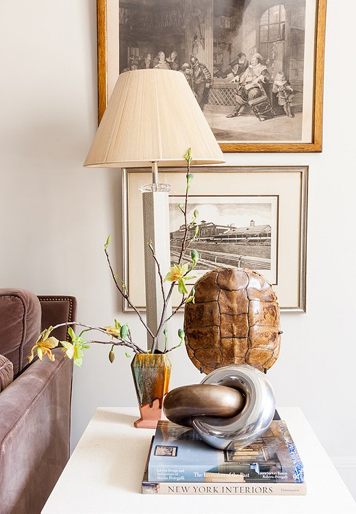Although she collects a lot of amazing objects, Smith keeps her space from feeling cluttered by corralling pieces into vignettes and letting other areas breathe.
