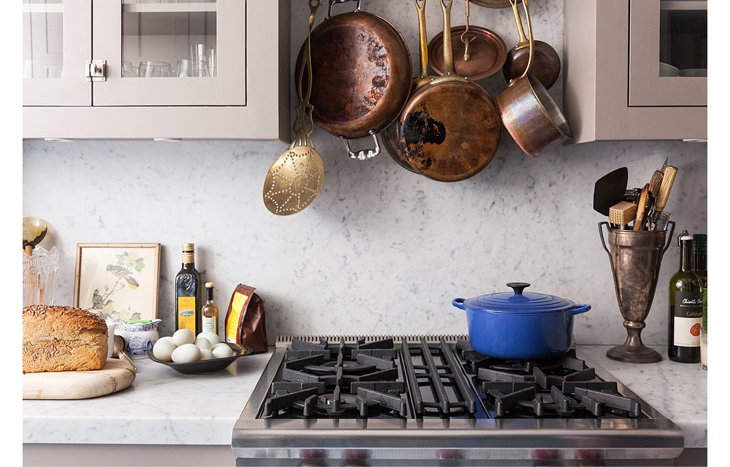 Smith decided on a seamless Carrara marble counter and backsplash for its modern and clean look.
