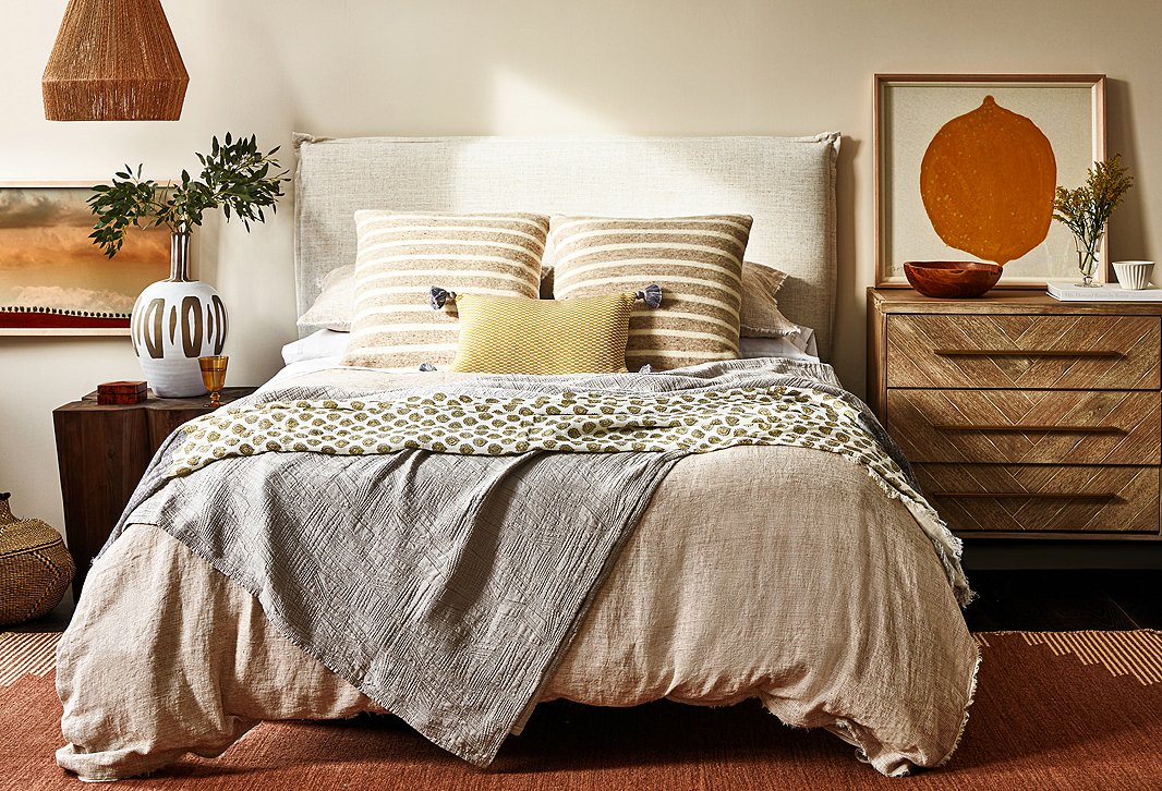 Earthy textures are the star of the Naturalist’s bedroom. Furnishings above include Metlili Missira Rug in Terracotta and Harlowe Double Dresser in Natural Gray.
