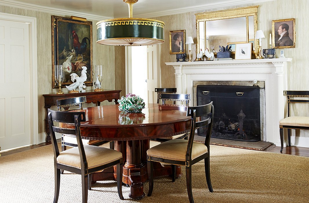 The mahogany Victorian dining table (inherited from Bunny’s great-aunt) is used for everyday dining and entertaining; in a low-ceilinged room an antique tole lamp makes a great alternative to a chandelier.
