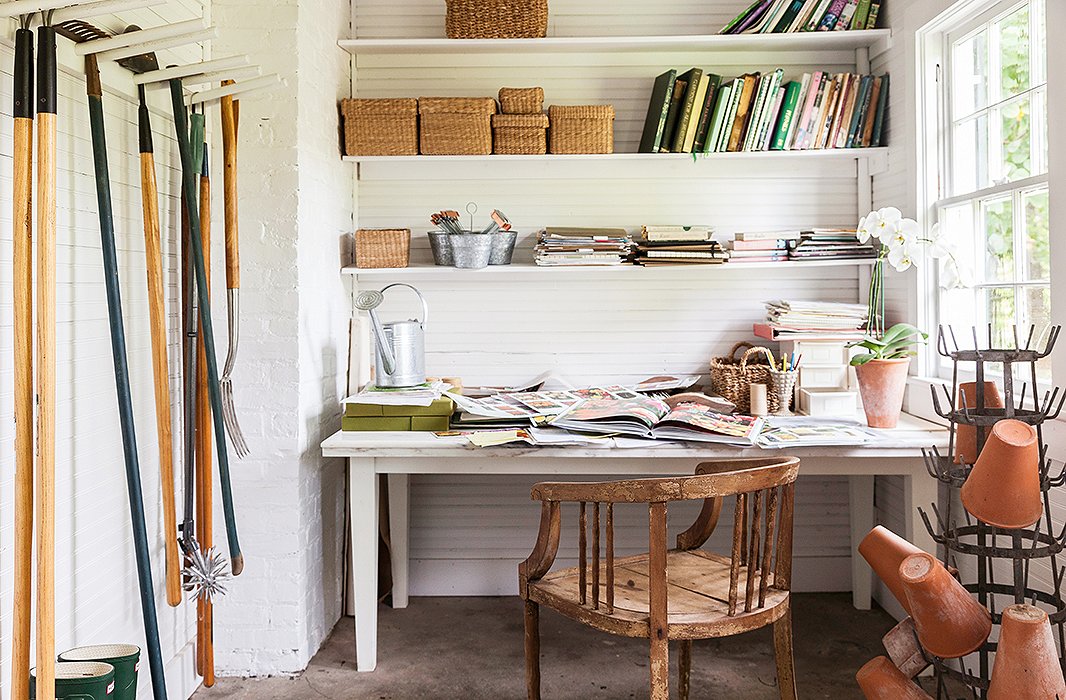 The little office in the glasshouse holds all of Carolyne’s gardening catalogs.
