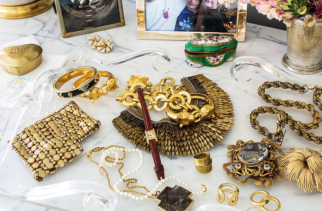 Bachmann favors vintage jewelry. “My style is not supergrand,” she says. She’ll often wear one big piece to amp up a simple outfit—be it one of her own dresses or a pair of jeans and a white button-down shirt.
