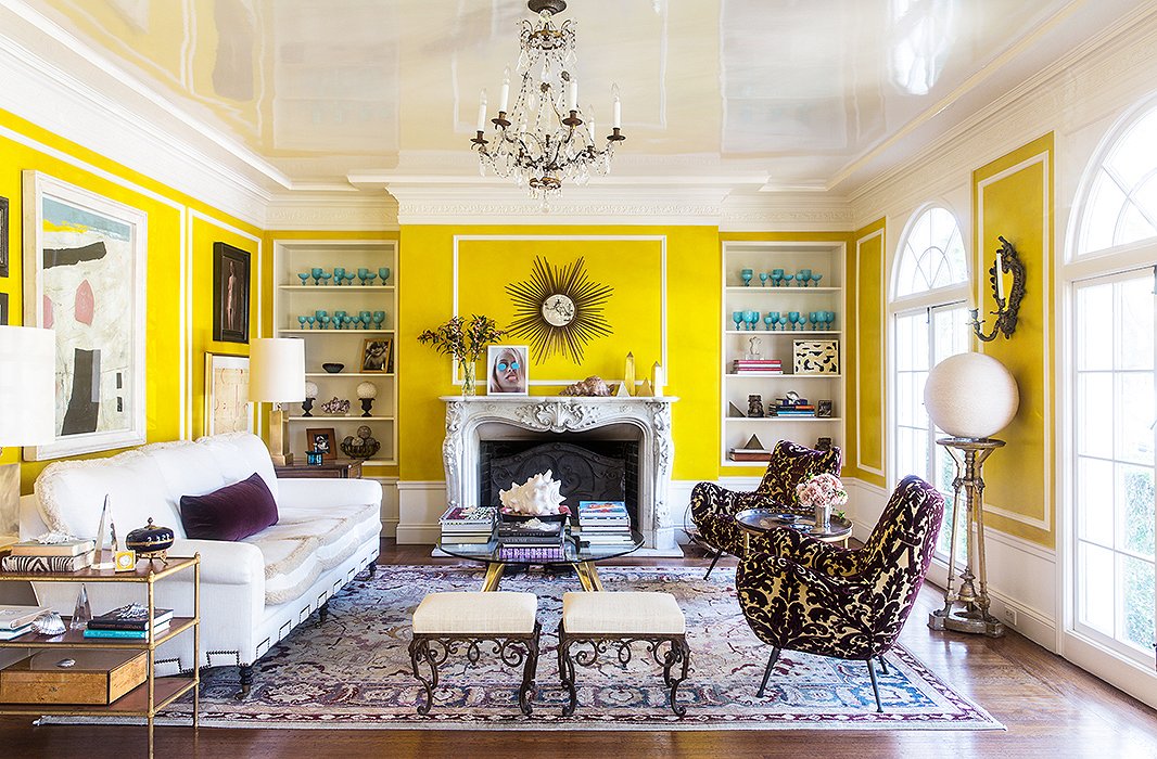 The eye-popping paint choice, coupled with the room’s abundance of natural light, allowed Bachmann to use mostly neutral furnishings but still achieve a cheery effect.
