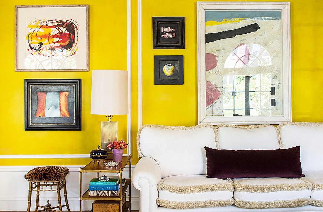 Bachmann’s taste in artwork is all over the map, ensuring that her living spaces are anything but stuffy. Her mix-and-match approach to framing helps heighten the room’s casually eclectic vibe.
